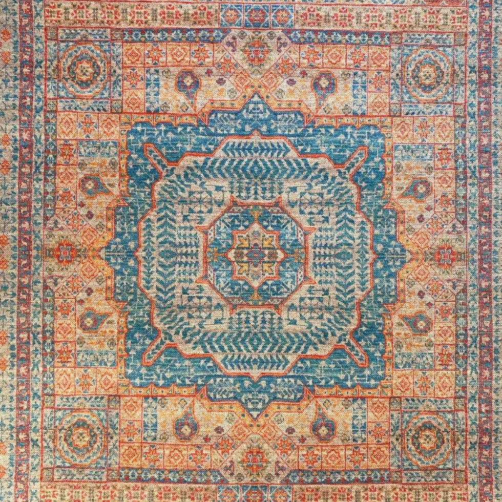 Tapis lavable bleu et orange de style persan